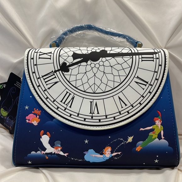 Loungefly Handbags - Loungefly Disney Peter Pan Clock Glow in the Dark Crossbody Bag Purse NWT 🧚‍♀️